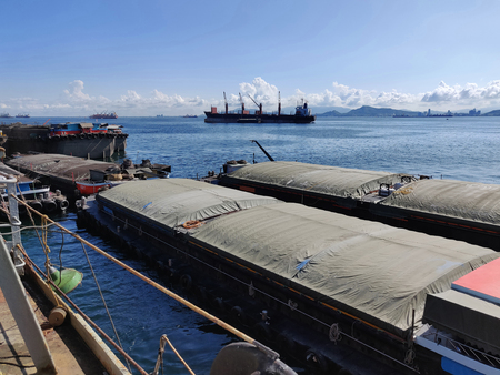 Many barges waiting tugboat for cast off.