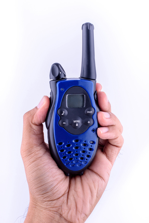 Blue radio communication in hand.の写真素材