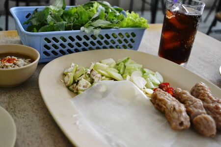 Vietnamese food have grilled pork with vegetables  wrapping flour
