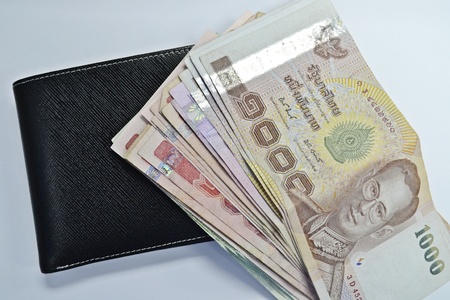 black leather wallet with money -Thai