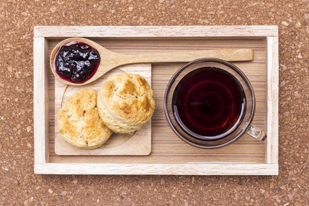 Sconejamcoffee on wooden tray.の写真素材