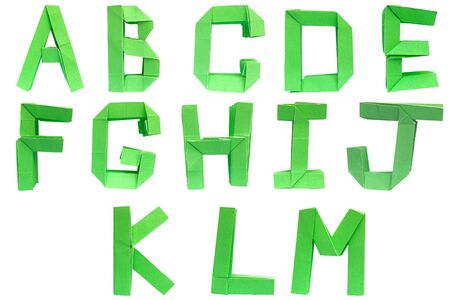 green paper is folded as a letterの写真素材