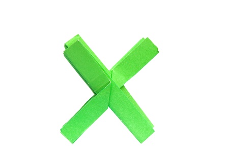 green paper is folded as a letterの写真素材