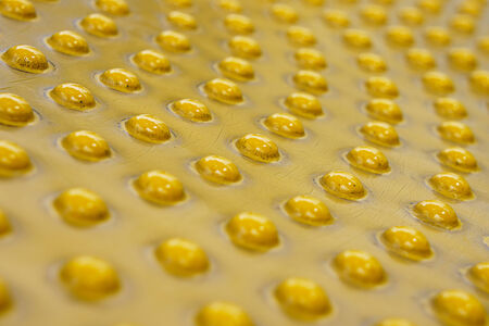 yellow sphere plastic texture as backgroundの写真素材