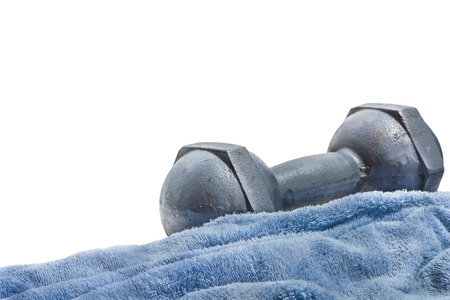 a dumbbell and a towelの写真素材