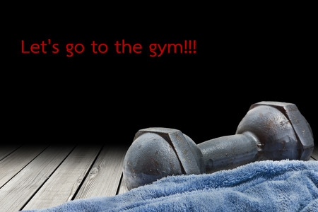 a dumbbell and a towelの写真素材