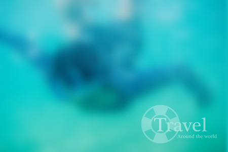 blur background of diving in the seaの写真素材