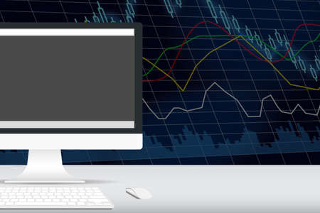 computer on the desk with stock exchange graph behindの写真素材