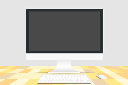 computer on wooden deskの写真素材