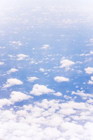 above the cloud in the sky from the planeの写真素材