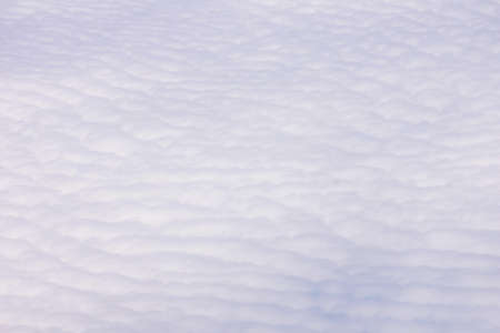 above the cloud in the sky from the planeの写真素材