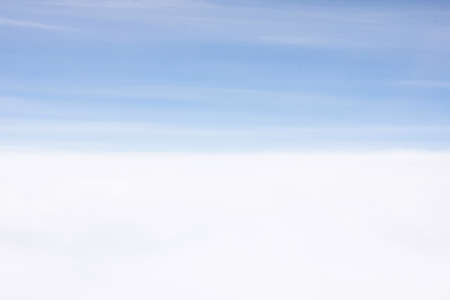 above the cloud in the sky from the planeの写真素材