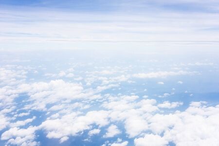 above the cloud in the sky from the planeの写真素材