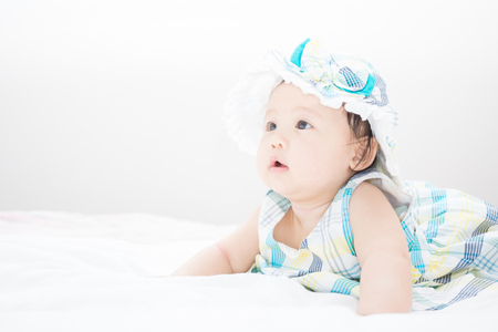 copy space with a baby just chest up for the first time and interesting in somethingの写真素材