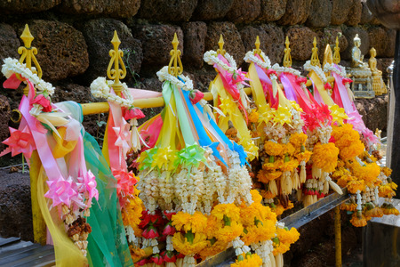 Marigold garland at sacred sanctuary Thailandの写真素材