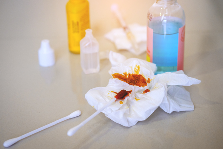 old Infectious waste on floor with syringes, alcohol, antiseptic,cotton bud, used to be.