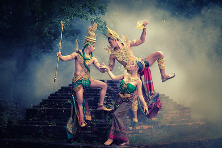 Man and woman wearing typical thai dress with thai style, Beauty fantasy Thai dress traditional costume on brick in old templeの写真素材