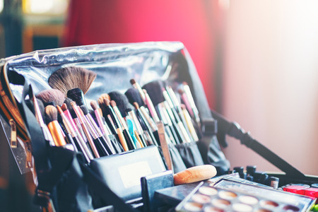 Case makeup artist. A set of brushes, powder, foundation. Tools make-up artist in a box, Professional makeup brush at workplaceの写真素材