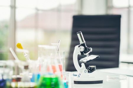 Chemical tube set development and pharmacy in laboratory with multicolored substances in Laboratory Microscopeの写真素材