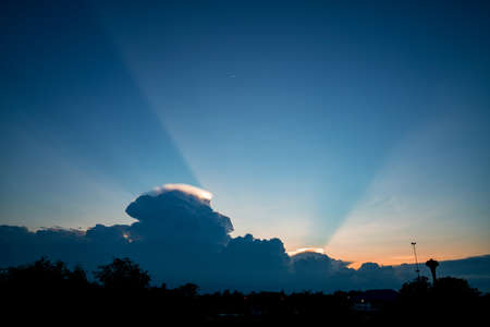 Light in the Dark and Dramatic Storm Clouds, sunset skyの写真素材