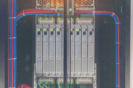 Rack Mounted Servers In A Server Room, Server rack audio cable. Severs computer in a rack at the...
