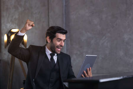 Thoughtful businessman think of project at workplace, new idea inspiration in home officeの写真素材