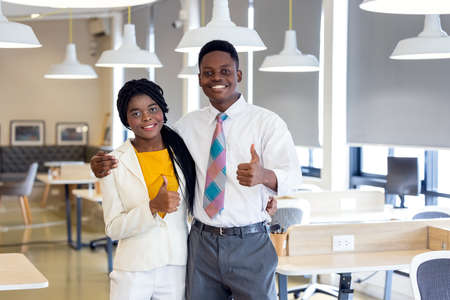 Portrait shot of young teenager lover couple relaxes at working spacesの写真素材