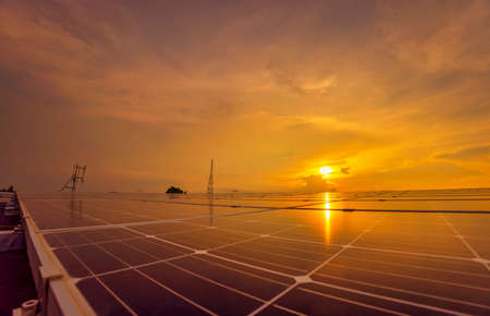 Solar cell with sunlight background, Green energy or safe energy, Solar power station - photovoltaics.の写真素材