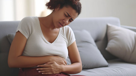 Female with stomach ache, Generative AIの素材
