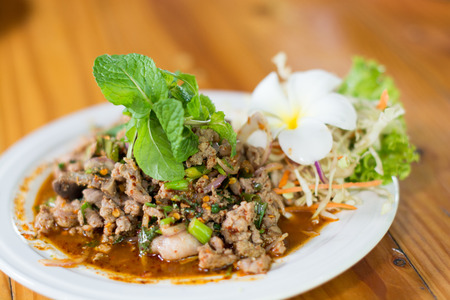 Spicy duck, Thailand food, local food, dishes, vegetables, frangipani, white, beautifully arranged plate of food put on the table, eat, hungry, delicious.の写真素材