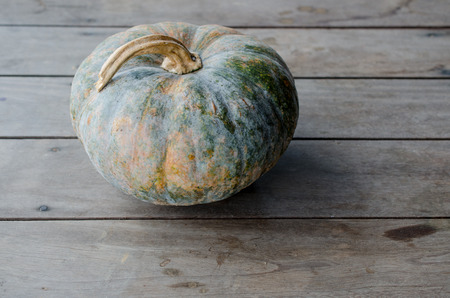 Put a pumpkin on wood blends.