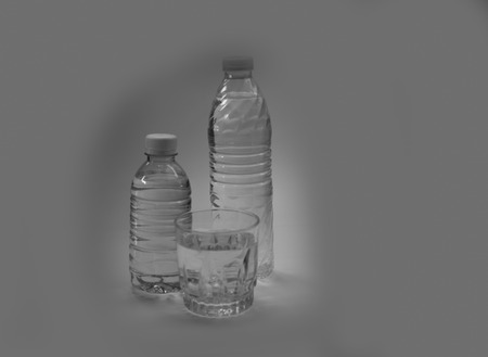 Clean water bottle and drink a glass of white foggy beautiful reclaimed.の写真素材