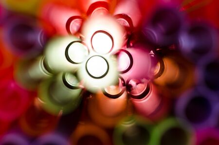 Plastic straw color. A light shone through a circular pipe. Took shape, beautiful colors Take a...