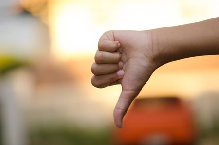 Hand symbolic sense Evening light beauty beautiful background blur.の写真素材
