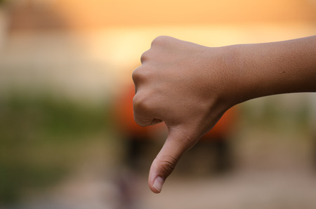 Hand symbolic sense Evening light beauty beautiful background blur.の写真素材