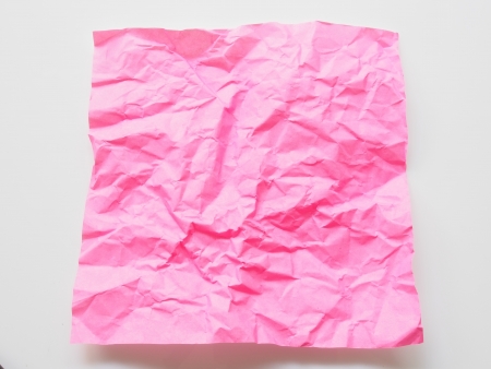 The Pink crumpled paper on a white backgroundの写真素材