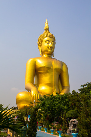 The golden buddha view at Wat Muang, Thailand.の写真素材
