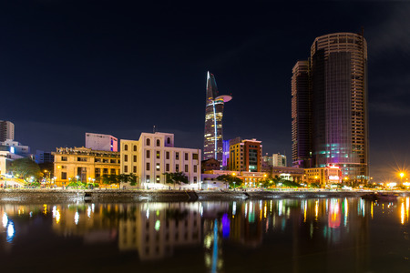 Ho Chi Minh City, Vietnam - September 9 2014 : Night view of high building on Tau Hu canal at Ho Chi...