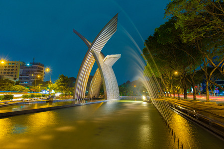 Ho Chi Minh City, Vietnam - December 13 2014: night view Metal Sculpture or peaceful monument, welcome statue at Hoang Van Thu Park on Truong Son street from Tan Son Nhat airport to downtown Ho Chi Minh City, Vietnam .のeditorial素材