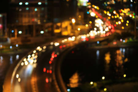 Abstract festive curves of bridges background with bokeh defocused lights of downtown of Ho Chi Minh...