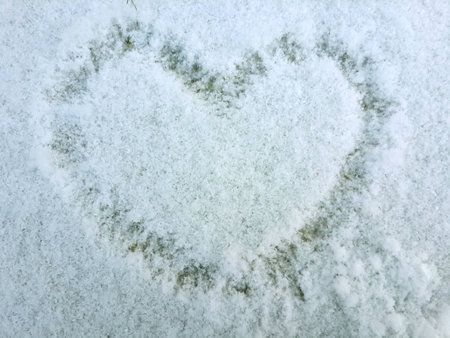 Heart-shape drawing on the snow