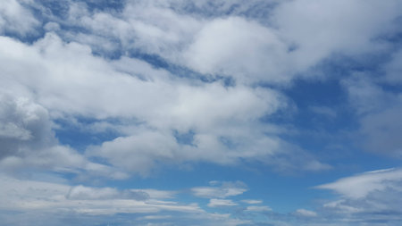 White cloudy and blue background