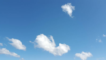 White cloudy and blue background