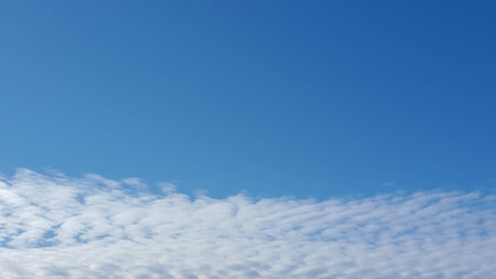 White cloudy and blue background