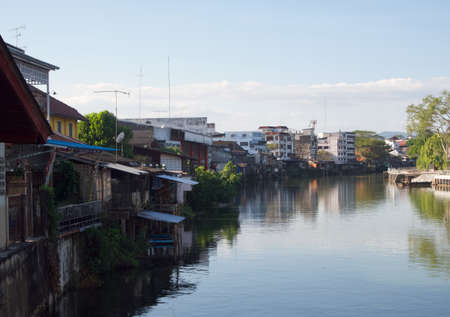 Village along the river in Thailandの写真素材
