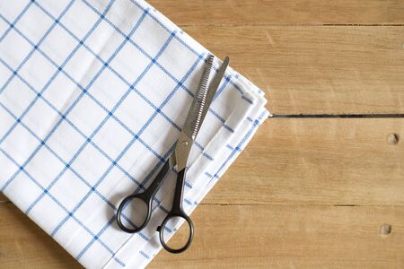 Scissors on the towel, haircut toolの写真素材