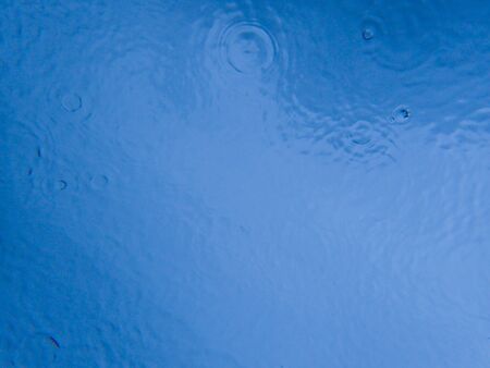 Drops of the rain on sea surface water