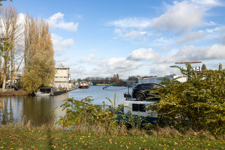 Industrial harbor view with ships in the Hanseatic city of Deventerの写真素材