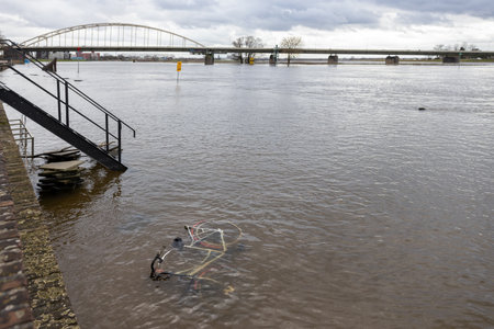 Cycle in the water of the IJssel river in Deventerの写真素材