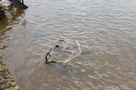 Cycle in the water of the IJssel river in Deventerの写真素材